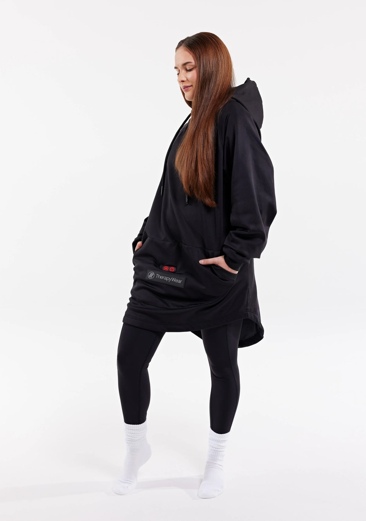 Woman wearing the TherapyWear Relief Hoodie, front angle